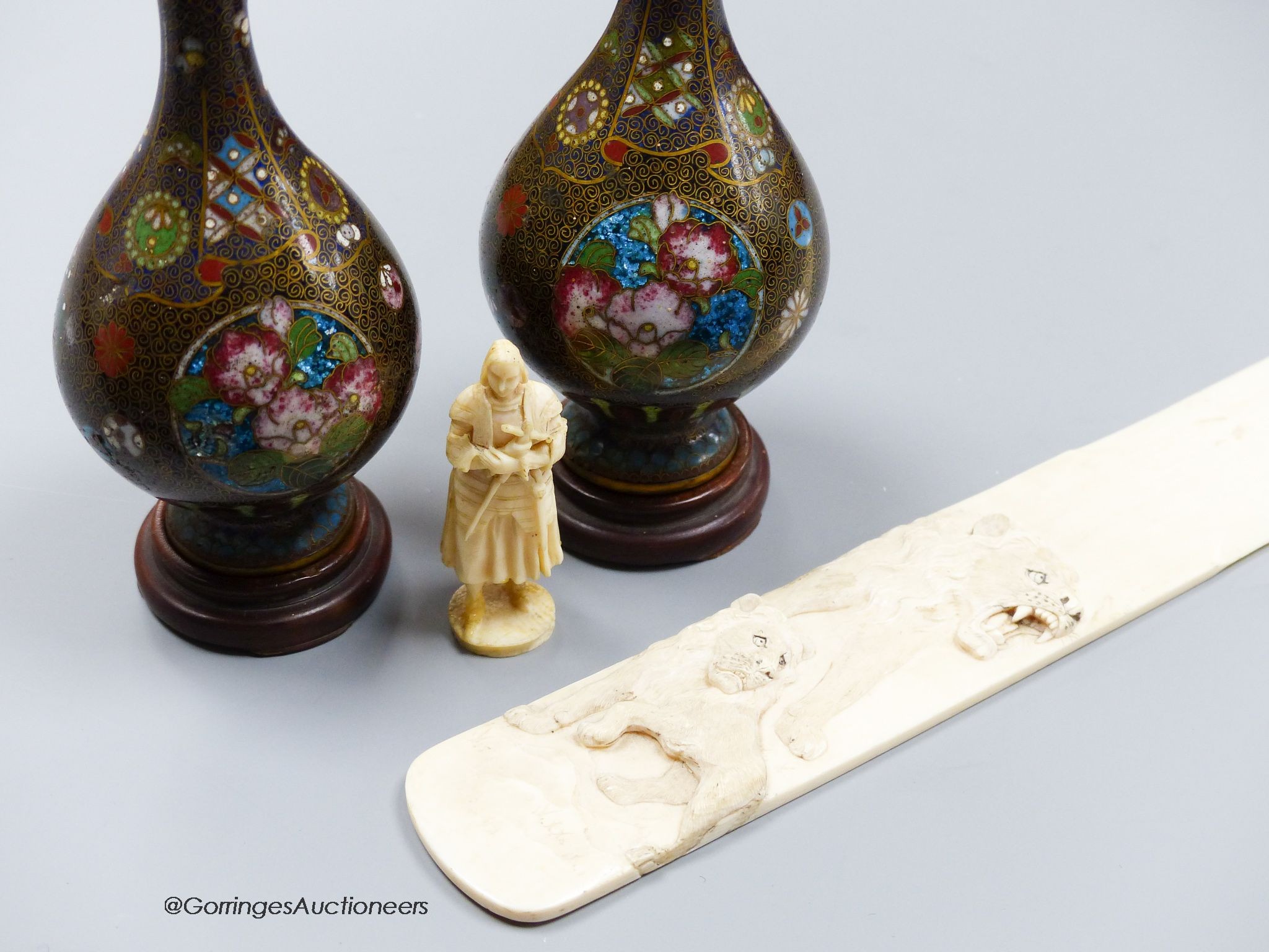 A pair of Japanese cloisonne miniature vases, a carved ivory paper knife, length 37cm, and a carved ivory figure